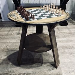 Wood Chess table with wood pieces one horse is a little chewed up), 22” round, 22” height)