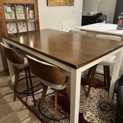 Large Table And Three Chairs