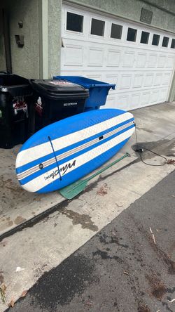 Free foam paddle board with paddle