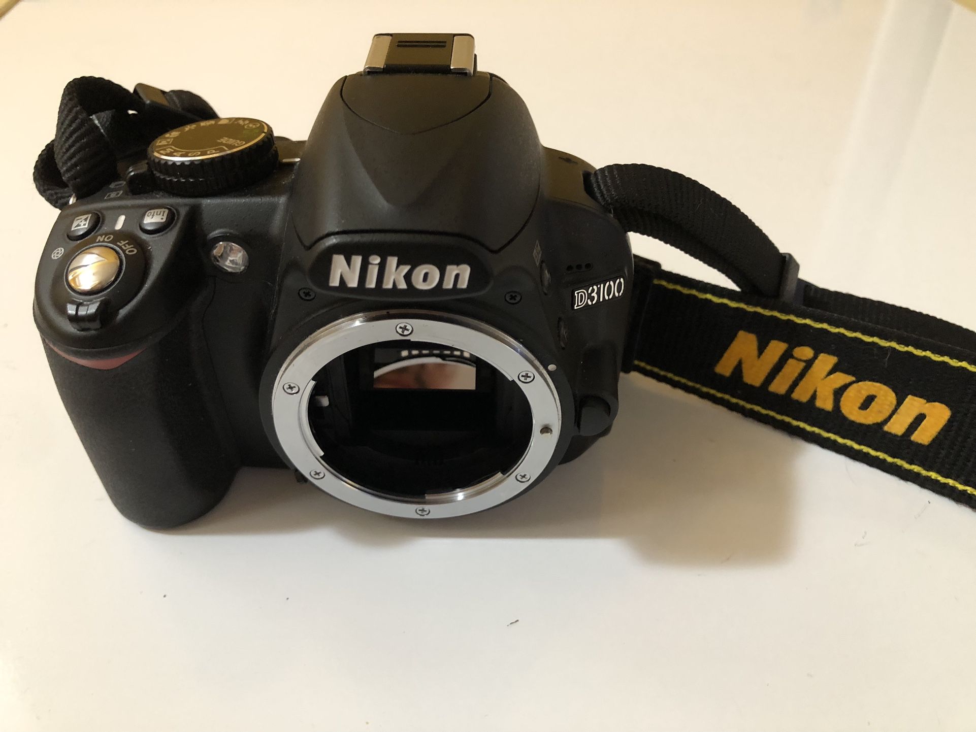 Nikon D3100 Camera In Good Condition . The cover to the SD card broke