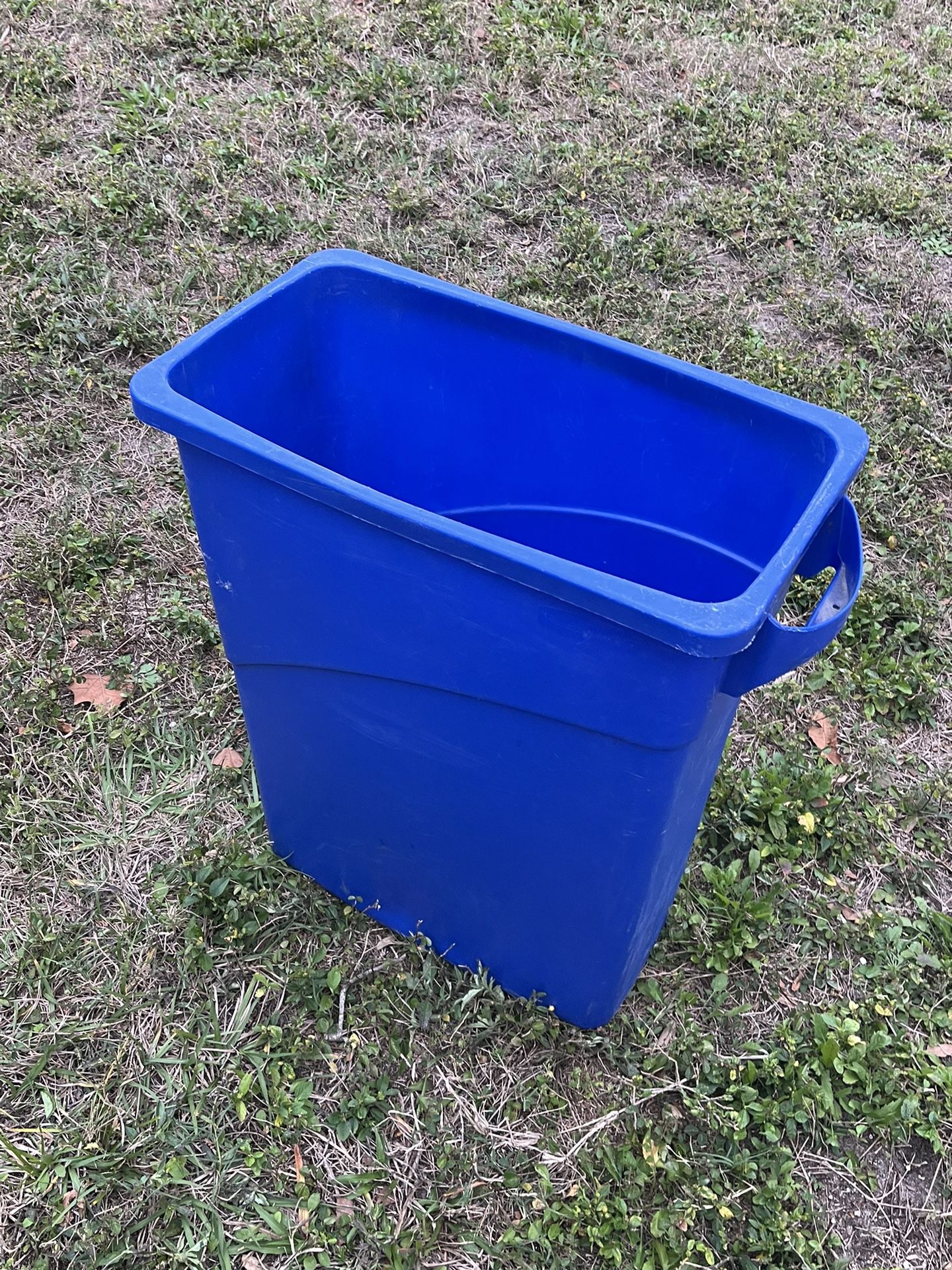 Tall Blue recycling container 