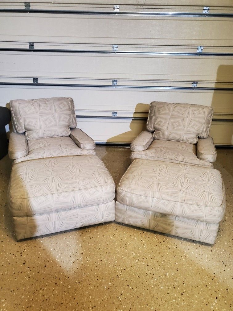 TWO LOUNGING CHAIRS WITH OTTOMANS