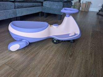 Kids Electric Wiggle Car / Ride-On + Charger | $50