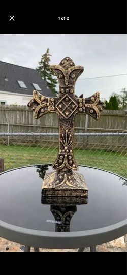 Golden Cross statue