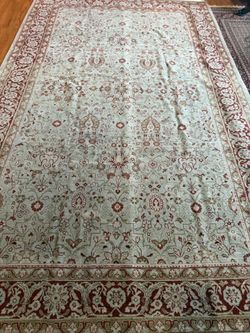 6’.9” X 11’.1” Hand knotted Persian all-over design Rug