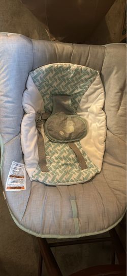 Baby clothes and bouncer