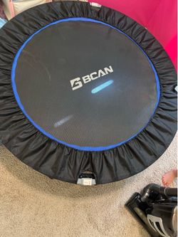 Exercise trampoline with bar