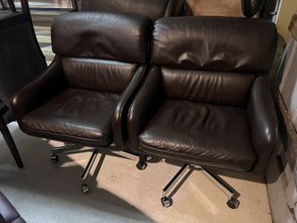 Leather Chairs (4 Available ) With Wheels. Very Nice