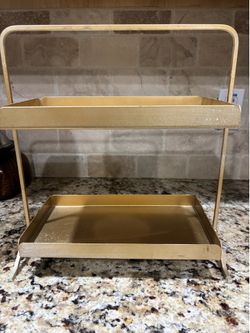 Gold stand $18