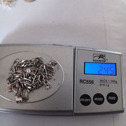 Cadena y dije de plata