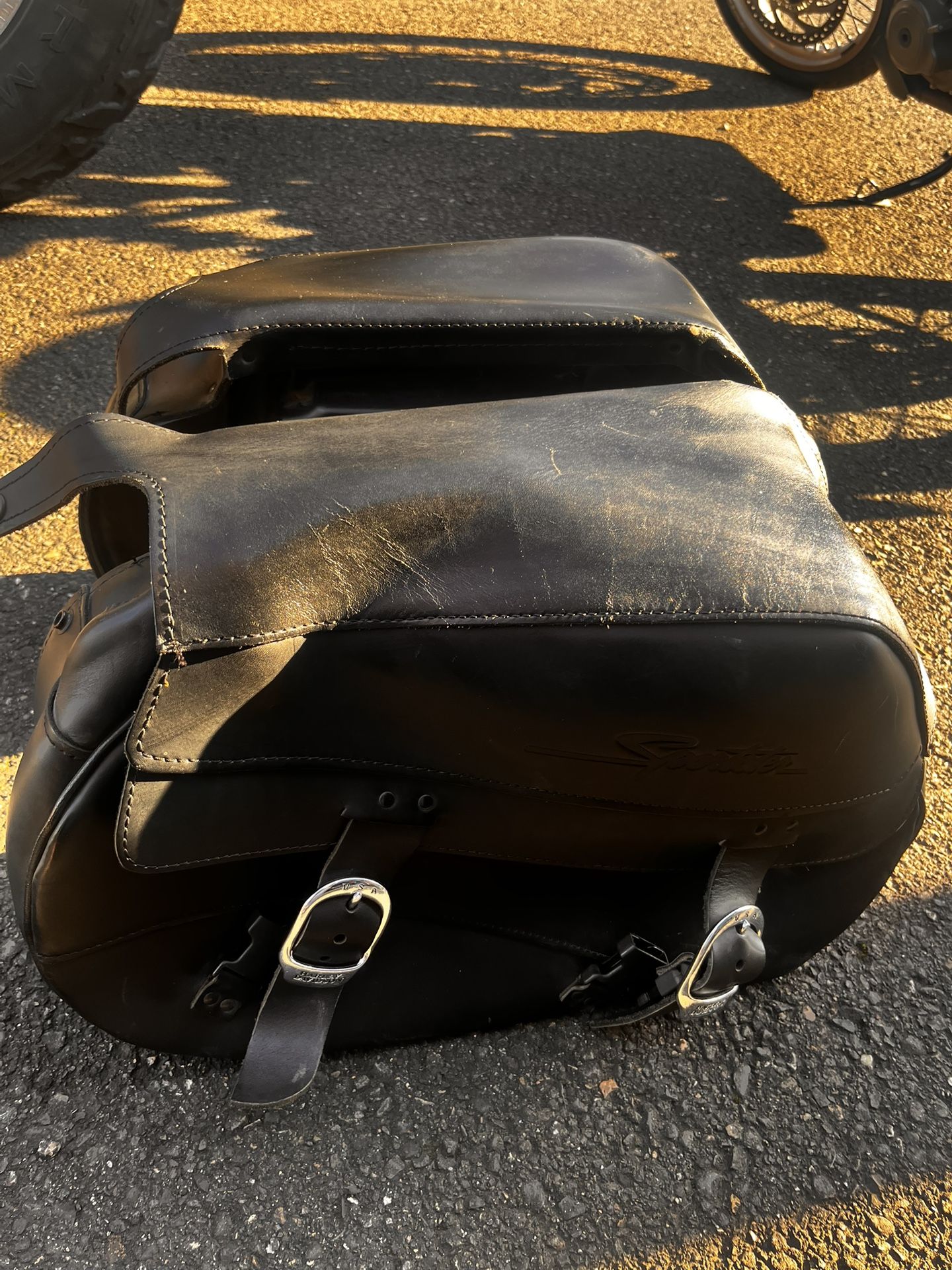 Harley Davidson black leather saddlebag with the embossed "Sportster" script logo