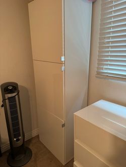 Tall White Storage Cabinet with Doors