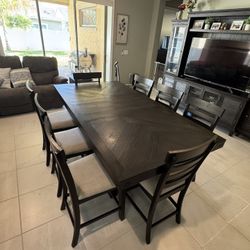 Dark brown counter height Dining Table With 8 Chairs. 