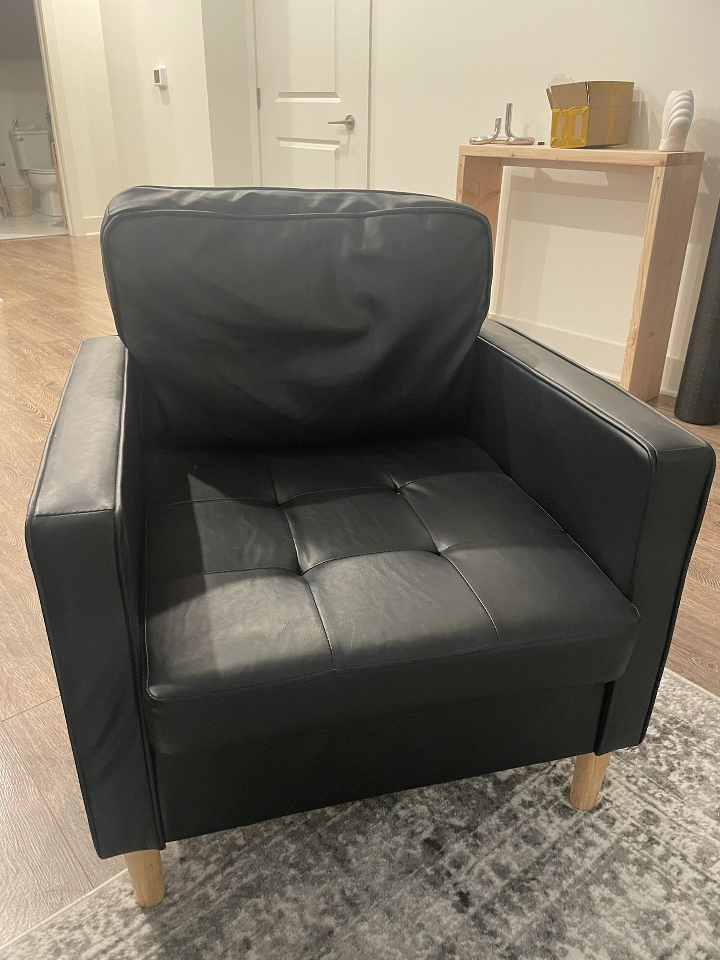 2 Black Leather Armchairs