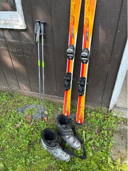 Dynastar 160 skis w/ poles and 320mm ski boots
