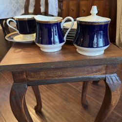 "Vintage Iranian cobalt blue and gold porcelain tea set - creamer, covered sugar bowl, and one cup with saucer