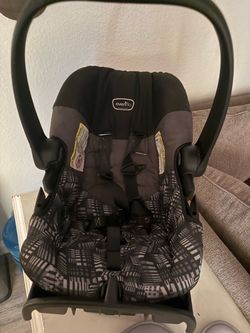 Infant car seat with base and inserts