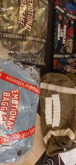 Assholes live forever duffle bags