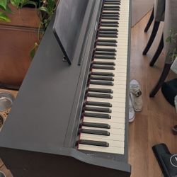 Roland RP-102 Digital Piano
