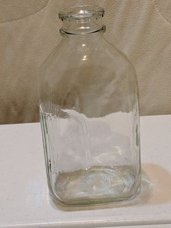 Old glass milk jug