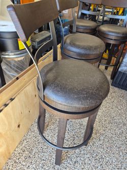 4 Swivel Bar Stools