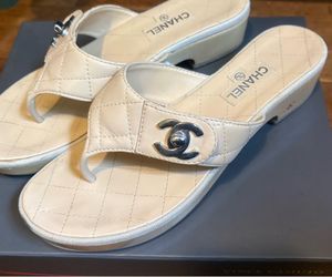 CHANEL Quilted Leather Thong Mules in Cream with Silver CC Logo