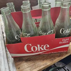 6 cartons different sizes coke cola bottles