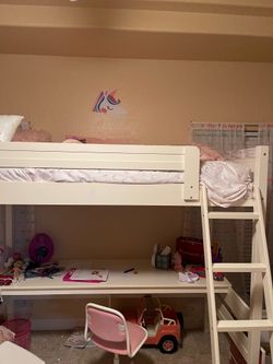 loft bed with desk below