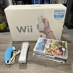 Nintendo Wii with Extra Controller, Extra Nunchuck, and Five Games - All CIB