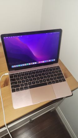Compact Apple MacBook 12-inch (2017) laptop in rose gold. This device has a 1.2 GHz Dual-Core Intel Core m3 processor, 8 GB of RAM, and 256 GB of flas