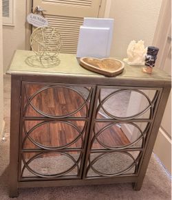 Mirrored Accent Cabinet with Circle Detail