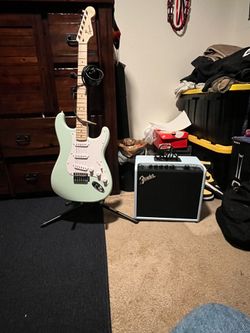 Squier Stratocaster Guitar with Fender Amp