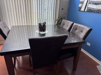 Marble table with chairs and bench