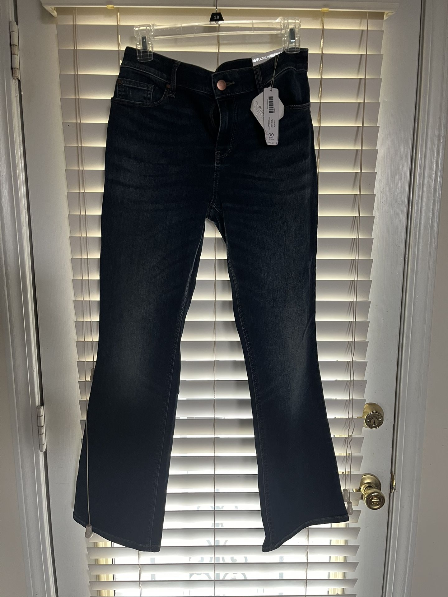 Brand new w/tag Chico's Women’s The Platinum Barely Boot Jeans, Size 00 Short.