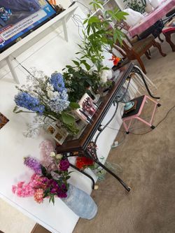 glass-top sofa/console table with the wrought iron base.