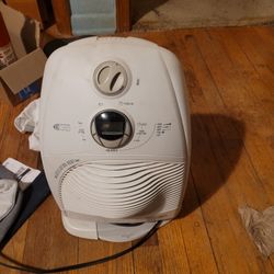 Electric Rotating Heater And Fan