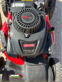 Lawn mower like New -Craftsman self-propelled lawnmower front wheel drive starts right up runs perfect.