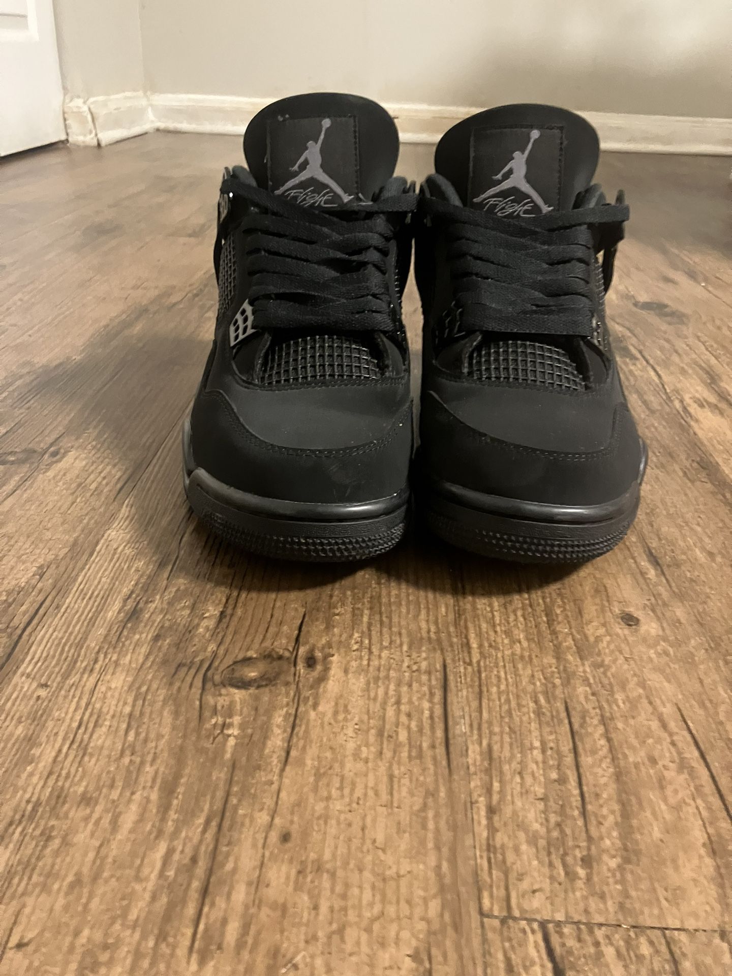 Black Cat Jordan 4’s