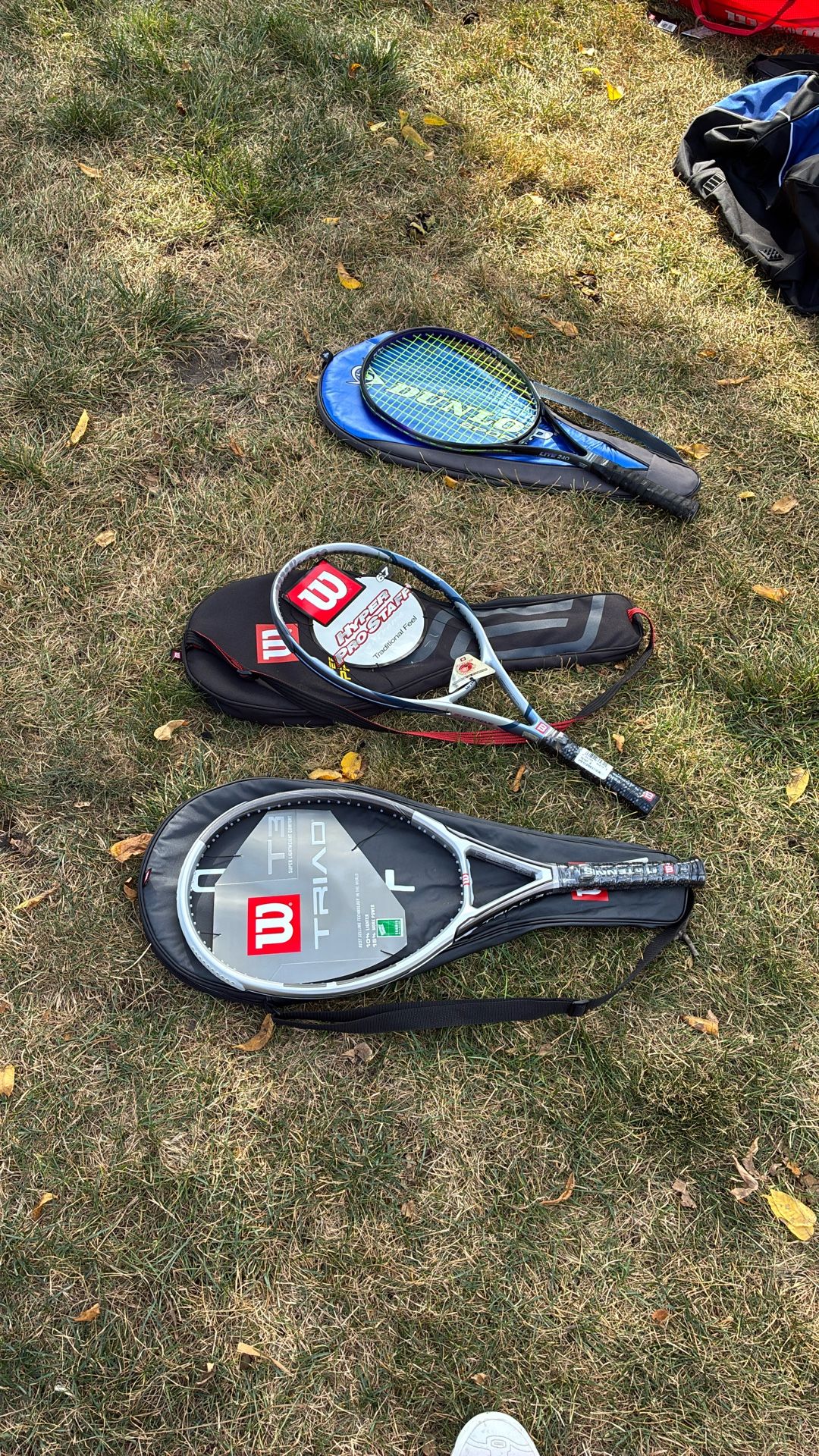 Tennis racket with bags
