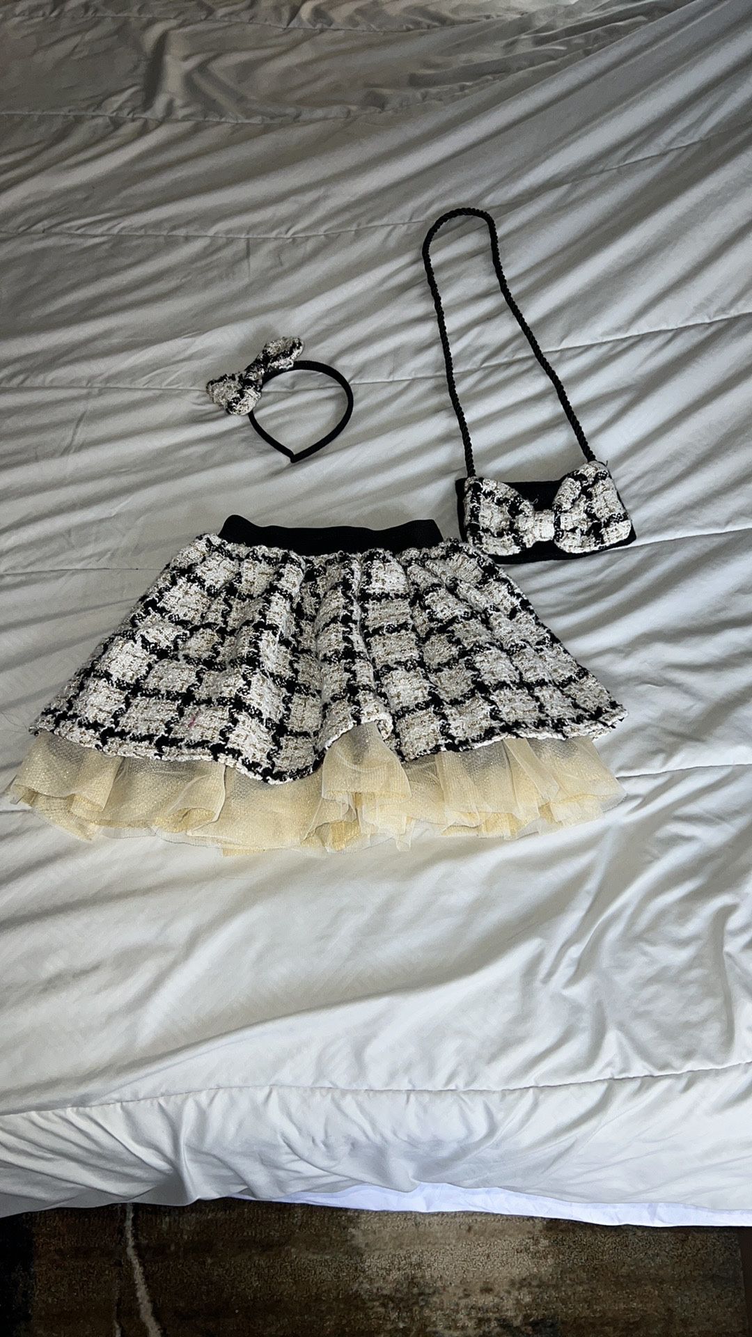 Beautiful girls skirt Tutu Made of fabric and tull with gold decoration, matching purse & headband size 5/6. The headband was never worn but has a loo