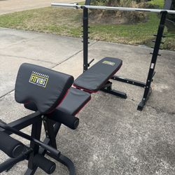 Weight bench with Olympic barbell 