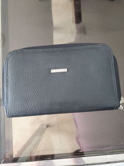 See 8 photos  New Womens wallets $5 each