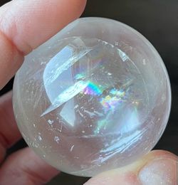 Clear Quartz Crystal Sphere with multiple rainbows