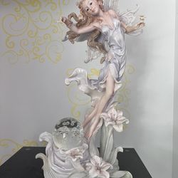 Porcelain Standing Fairy With Glass Ball