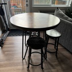 Dark Hardwood Round Top/Steel Legged Table W/ Three Stools
