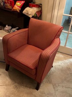 l orange loveseat,  or lounge chairs