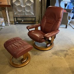 Ekornes Burgundy Leather Recliner And Ottoman
