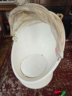 White spinning egg chair
