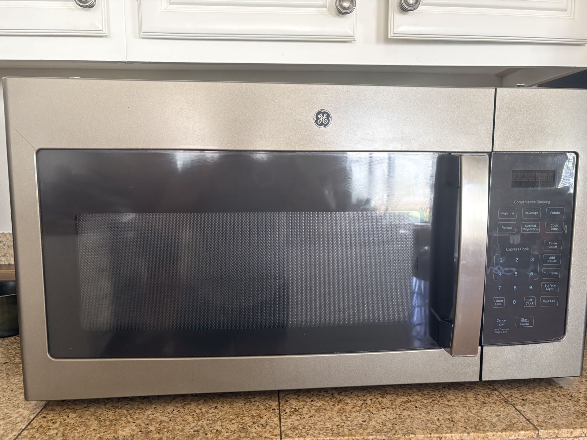 1.6 cu. ft. Over the Range Microwave in Slate, Fingerprint...
