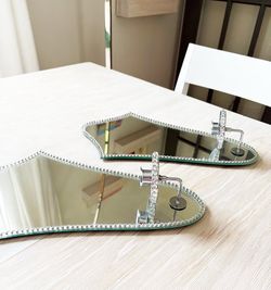 Hand-cut mirror and rhinestone wall sconces